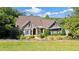 Charming home featuring stone accents, manicured landscaping, and a welcoming front entrance at 11 York Trce, Cartersville, GA 30121