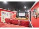 Home theater featuring plush seating, projector, and a stage area with musical instruments at 11 York Trce, Cartersville, GA 30121