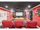 Comfortable home theater with projector, screen, and seating, perfect for movie nights and entertaining guests at 11 York Trce, Cartersville, GA 30121
