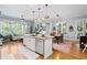Spacious kitchen featuring a central island, stainless appliances, and hardwood floors at 11 York Trce, Cartersville, GA 30121