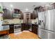 Modern kitchen featuring stainless steel appliances, granite countertops, and stylish backsplash at 11 York Trce, Cartersville, GA 30121