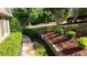 Professionally landscaped yard featuring a stone pathway and diverse plants and greenery at 11 York Trce, Cartersville, GA 30121