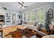 Cozy living room with hardwood floors, ample natural light, and comfortable seating arrangements at 11 York Trce, Cartersville, GA 30121