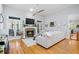 Bright living room showcasing a stone fireplace, hardwood floors, and neutral color palette at 11 York Trce, Cartersville, GA 30121