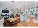 Open-concept living space with kitchen, dining, and Gathering areas for easy entertaining at 11 York Trce, Cartersville, GA 30121