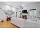 Spacious living room featuring a stone fireplace, modern decor, and lots of natural light at 11 York Trce, Cartersville, GA 30121