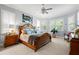 Inviting main bedroom with ample natural light, elegant decor, and neutral carpet floors at 11 York Trce, Cartersville, GA 30121