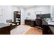 Well-appointed home office with dark wood furniture, ample storage, and a comfortable chair at 11 York Trce, Cartersville, GA 30121