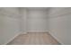 Spacious walk-in closet with carpet flooring and metal shelving for optimal storage at 165 Haverling Pass, Hampton, GA 30228