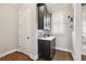 Bar area with dark cabinets, granite countertop, wine rack, and window at 2362 Saint Davids Nw Sq # 4, Kennesaw, GA 30152