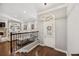 Welcoming foyer with hardwood floors, chandelier and staircase leading into the living room at 2362 Saint Davids Nw Sq # 4, Kennesaw, GA 30152