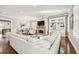 Inviting living room with hardwood flooring, stone fireplace and comfortable seating at 2362 Saint Davids Nw Sq # 4, Kennesaw, GA 30152