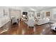Spacious living room with hardwood floors, fireplace, built-in bookshelves and stylish decor at 2362 Saint Davids Nw Sq # 4, Kennesaw, GA 30152