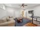 Cozy living room with hardwood floors and ample natural light, perfect for relaxation at 2362 Saint Davids Nw Sq # 4, Kennesaw, GA 30152
