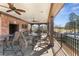 Community outdoor patio with views of the tennis courts, ceiling fans and a tv at 2362 Saint Davids Nw Sq # 4, Kennesaw, GA 30152