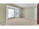 Bedroom featuring neutral paint, carpet, bay windows and a large built in book case at 315 Towergate Pl, Atlanta, GA 30350