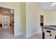 View from bedroom shows light neutral walls and carpeting. Also views of entry way, kitchen and other rooms at 315 Towergate Pl, Atlanta, GA 30350