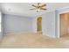 View of a large bedroom, showing the bathroom entrance to the right and shower through the doorway at 315 Towergate Pl, Atlanta, GA 30350