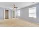 Bedroom featuring neutral colored walls, carpeting, bright windows and a double door closet at 315 Towergate Pl, Atlanta, GA 30350