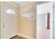 Entryway with a white front door, hardwood floors, and an entrance to another room at 315 Towergate Pl, Atlanta, GA 30350