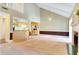 Spacious living room featuring a fireplace, high ceilings, and seamless access to the kitchen at 315 Towergate Pl, Atlanta, GA 30350