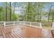 Spacious deck with white railing; great for entertaining at 2118 Township Dr, Woodstock, GA 30189