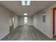 Spacious finished basement with modern gray flooring and recessed lighting at 2234 Oak Falls Ln, Buford, GA 30519