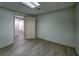Finished basement space with modern gray flooring and a white door at 2234 Oak Falls Ln, Buford, GA 30519