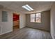 Finished basement space featuring a window and view into a kitchenette area at 2234 Oak Falls Ln, Buford, GA 30519