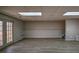 Large basement space featuring walkout access, ideal for recreation or additional living area at 2234 Oak Falls Ln, Buford, GA 30519