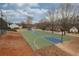 Well-maintained community basketball court with hoops and clear boundary lines for recreational use at 2234 Oak Falls Ln, Buford, GA 30519