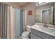 Bathroom features a shower/tub combo and a single sink vanity with modern finishes at 2234 Oak Falls Ln, Buford, GA 30519