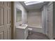 Full finished basement bathroom featuring a tub-shower combo and a white vanity at 2234 Oak Falls Ln, Buford, GA 30519