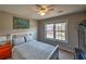 Bright bedroom with a large window, modern decor, and calming color scheme at 2234 Oak Falls Ln, Buford, GA 30519