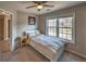 Comfortable bedroom featuring a large window offering natural light, perfect for relaxation at 2234 Oak Falls Ln, Buford, GA 30519