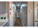 Hallway with hardwood floors that features a tiled counter along the wall and access to other rooms at 2234 Oak Falls Ln, Buford, GA 30519