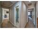 Upstairs hallway with doors leading to bathroom and bedrooms, offering a functional layout at 2234 Oak Falls Ln, Buford, GA 30519