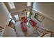Aerial view showcasing a living room with ample natural light and a cozy fireplace feature at 2234 Oak Falls Ln, Buford, GA 30519