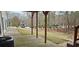 This backyard boasts a large patio and mature landscaping, ideal for outdoor living at 3715 Millers Pond Way, Snellville, GA 30039