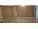 A basement features tiled floors and white doors at 3715 Millers Pond Way, Snellville, GA 30039
