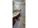 Bathroom with double sink, medicine cabinet and cabinet storage at 3715 Millers Pond Way, Snellville, GA 30039