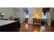Spacious bedroom features hardwood floors, two windows and desk at 3715 Millers Pond Way, Snellville, GA 30039