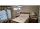 Bedroom with comfortable bed, nightstands, and ample window light at 3715 Millers Pond Way, Snellville, GA 30039