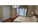 Bedroom features a plush bed, ample natural light, and neutral walls at 3715 Millers Pond Way, Snellville, GA 30039