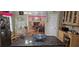 View of a kitchen featuring granite counters and a glimpse of a living space at 3715 Millers Pond Way, Snellville, GA 30039