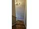 A staircase features wood steps and a simple handrail at 3715 Millers Pond Way, Snellville, GA 30039