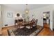 Dining room with hardwood floors and elegant furnishings at 3858 Fenway Xing, Marietta, GA 30062