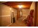 Unfinished basement hallway with exposed ceiling and partially finished walls at 4288 Wyndham Park Cir, Decatur, GA 30034
