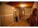 Unfinished basement hallway with exposed ceiling and partially finished walls at 4288 Wyndham Park Cir, Decatur, GA 30034