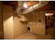 Unfinished basement room, exposed ceiling ducts, and partially finished walls at 4288 Wyndham Park Cir, Decatur, GA 30034
